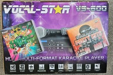 Vocal Star VS-600 *plus* 18 CD's. Includes 2 Microphones, remote, and cables