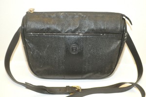 black vinyl crossbody bag
