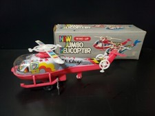 VINTAGE PLASTIC TIN WIND-UP FRICTION PINK FIRE CHIEF HELICOPTER 1980'S BOXED