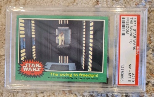 1977 Topps Star Wars #219 The swing to freedom! — PSA 8
