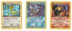 LOT OF THREE (3) VINTAGE 1ST EDITION POKEMON CARDS W/ CHARIZARD