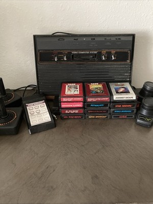 Atari Gaming Console w/ Controllers & Games (untested)