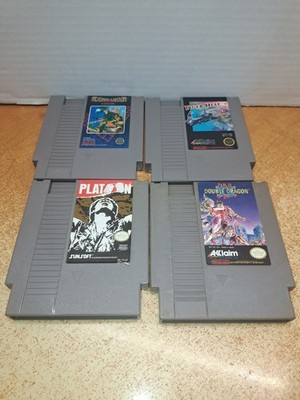 lot of 4 nes games platoon, double dragon 2, tiger-heli, commando