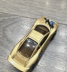 Hot Wheels Jaguar XJ220 * Color: Dorado metálico con gráficos azules y negros — photo 3