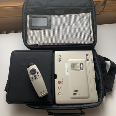 PLUS U3-1080 PORTABLE PROJECTOR with carrying case and remote.