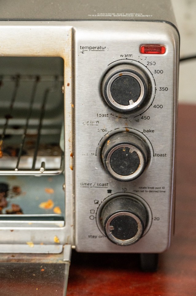 Crusty Toaster Oven, plenty of crumbs and crap that smells like old ...