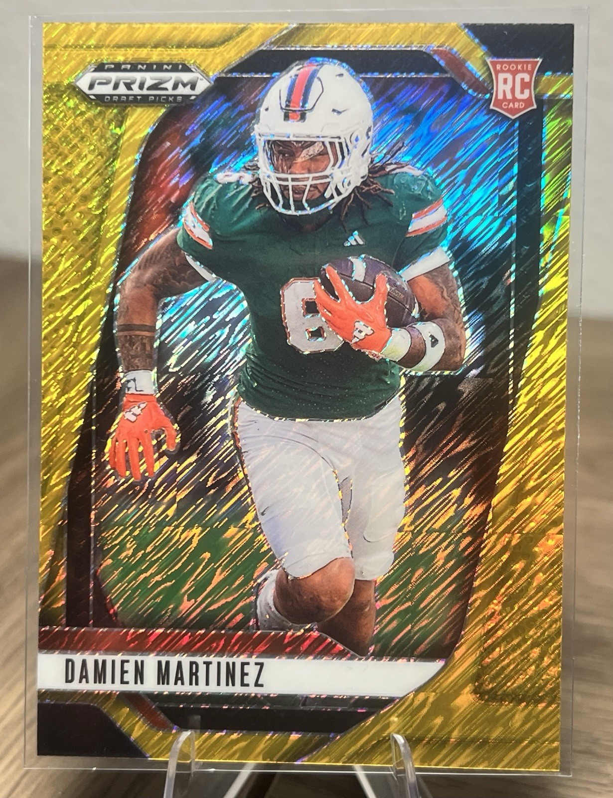 Damien Martinez Panini Prizm Draft Picks #58 Gold Shimmer