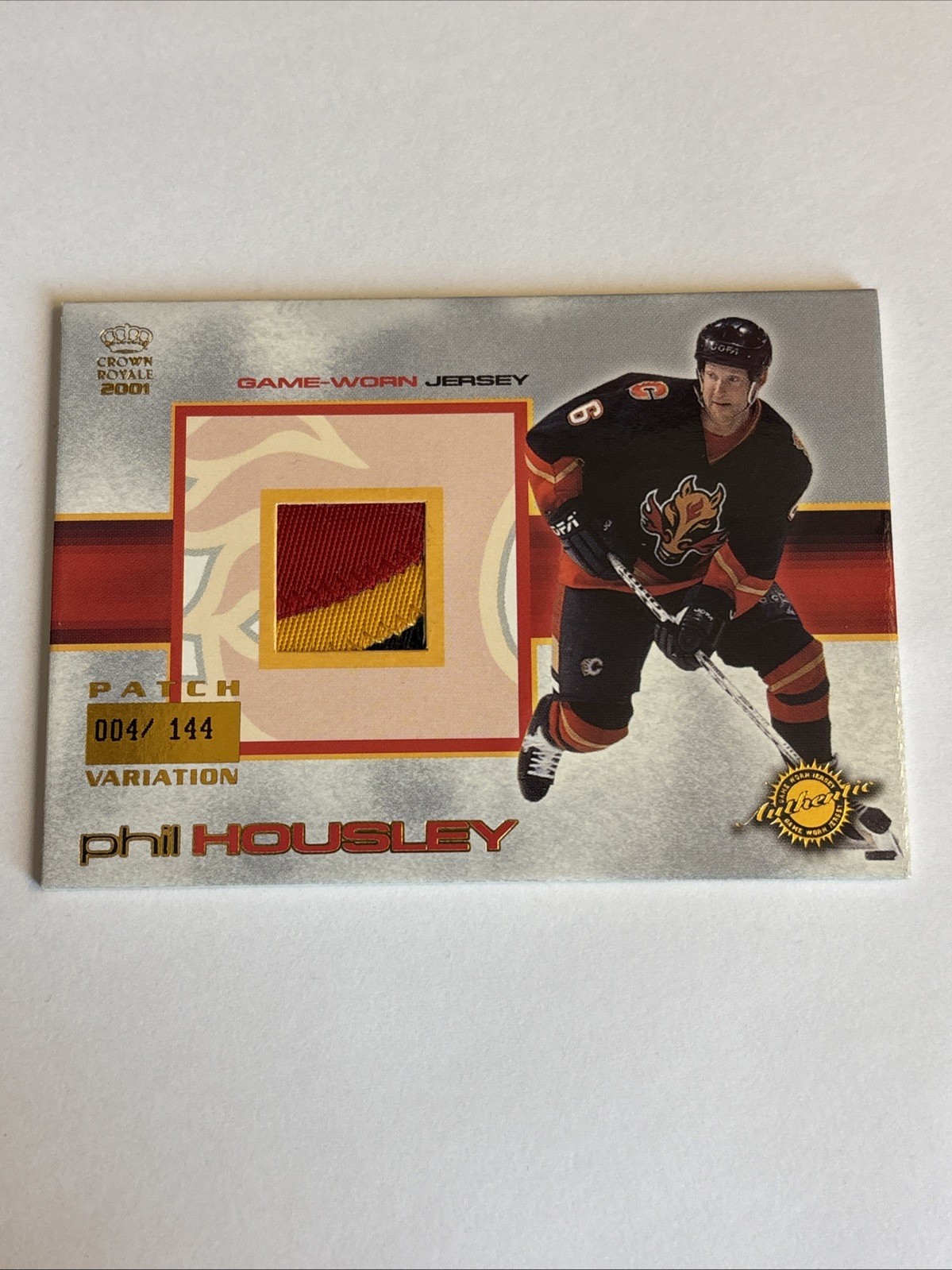 2000-01 Pacific Crown Royale Game Worn Jerseys Phil Housley Patch Variation #4