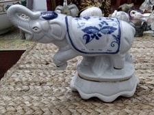 Vintage blue and white porcelain lucky trunk up elephant, 7 inches,