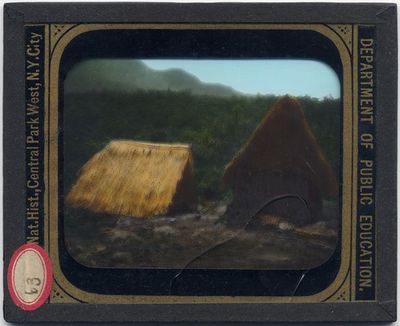 PHOTO ON GLASS - LANDSCAPE W/ 2 SMALL GRASS HUTS