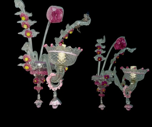 pair of white and pink rezzonic sconces with glass paste details