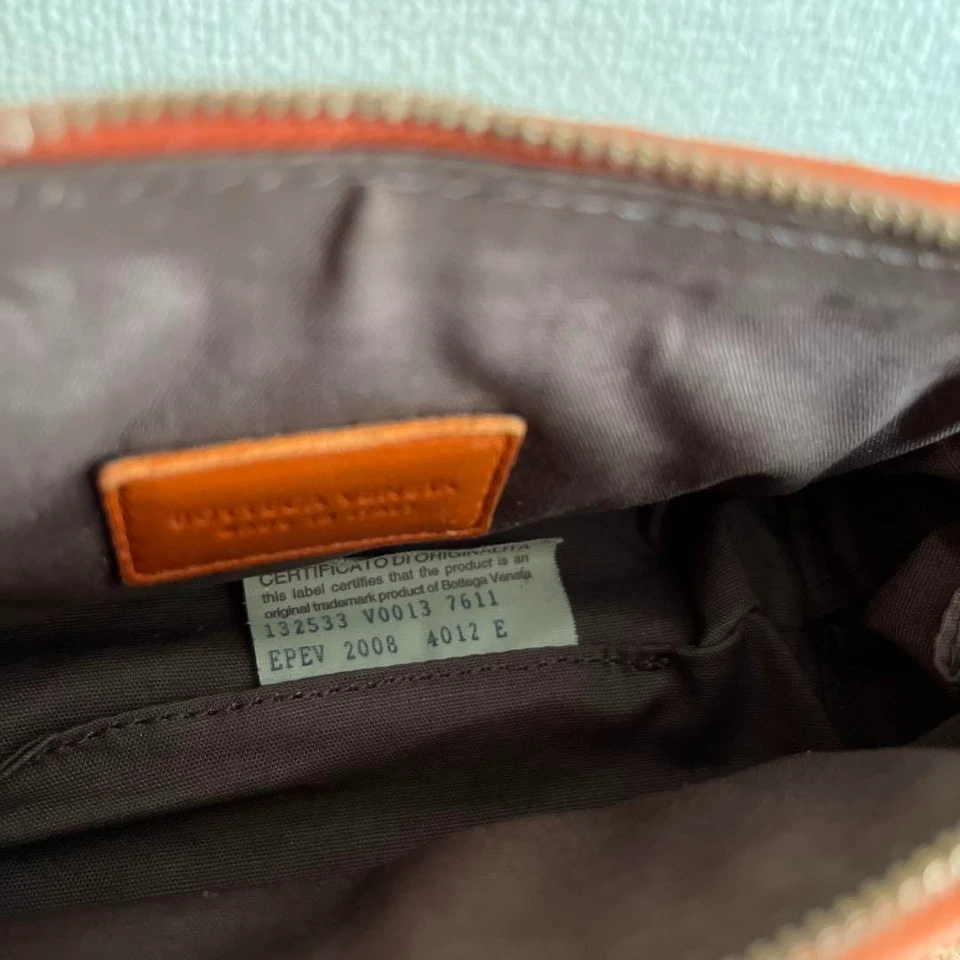 Bolsa Bottega Veneta Intrecciato en Hermes Naranja con Cremallera Dorada. Foto 4 de 4