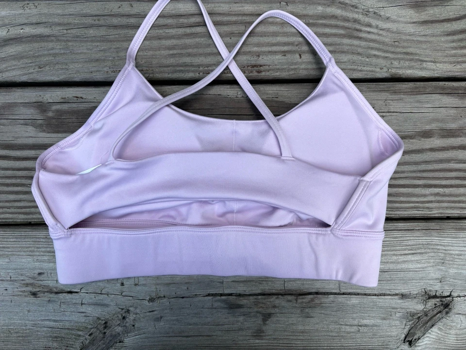 Sujetador deportivo para mujer Reebok rosa claro talla M almohadillas extraíbles elásticas Foto 2 de 4