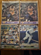 Two 8x10 Magic Johnson Action Photos, 1 Trammell, 1 Nokes Sealed