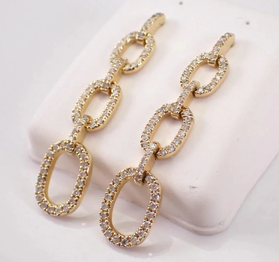 Pendientes colgantes de moissanita de corte redondo de 1 quilate enchapados en oro amarillo de 14 quilates Foto 3 de 4