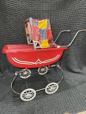 Vintage Red Baby Carriage Collectible with Patchwork Canopy and White Wheels