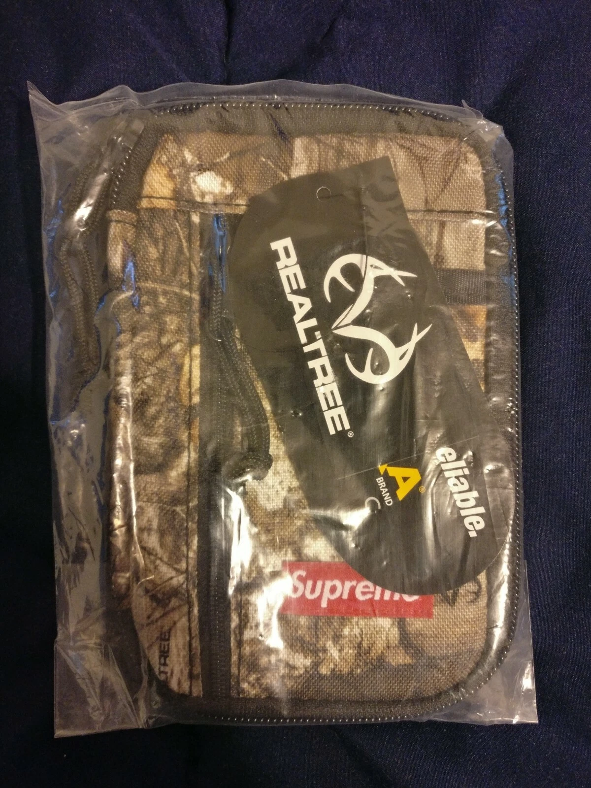 Pochette zippée portefeuille suprême REALTREE OS FW19 FLAMBANT NEUF, 100 % AUTHENTIQUE DEADSTOCK DS