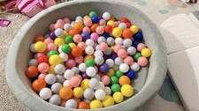 Gray Children’s Ball Pit With Multicolor Balls