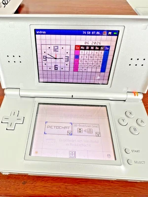 Nintendo DS Lite Silver mit OVP & Zusatzpaket sehr gepflegt, wie neu - Bild 1 von 4