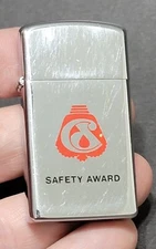1976 Oil & Gas Drill Bit Safety Award Chrome Zippo Lighter Niagara Falls Insert