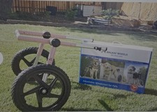 Lightly used Walkin' Wheels Large dog pink wheelchair.