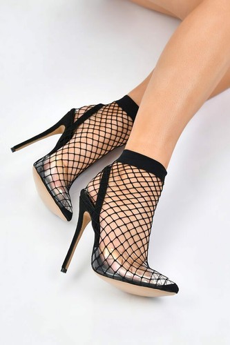Black fishnet sock boots with pointed 