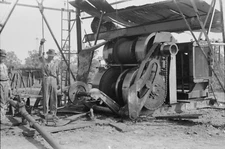 8" x 10"  Roustabouts During a Lull in Painting Derrick. Seminole Oil Field,