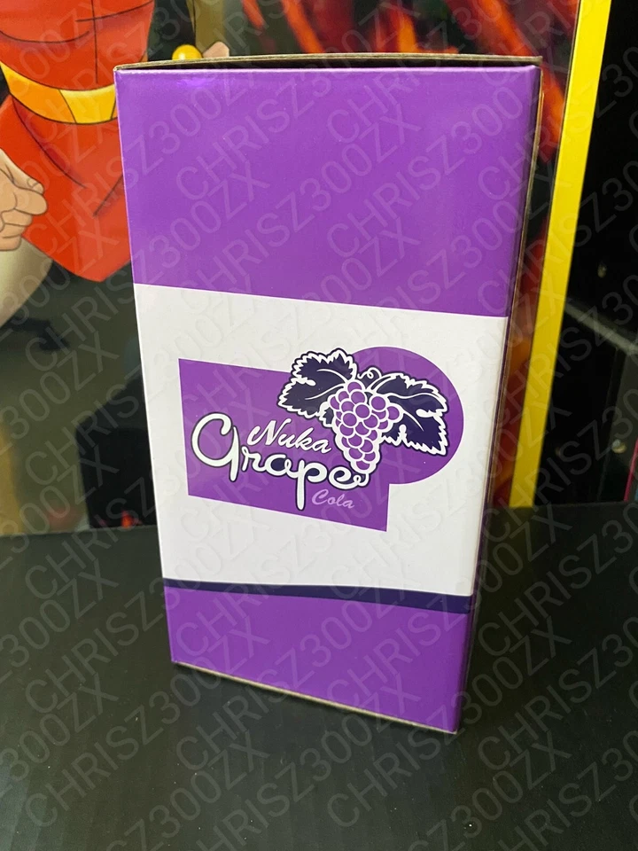 Fallout Nuka Cola Grape Purple Glass Bottle + 10 Caps Tin Rocket Statue Figure - Image 3 of 4