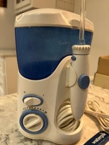Used Water Pik Flosser Machine w/Package of Piks/Model WP 100W/Very Good Cond.