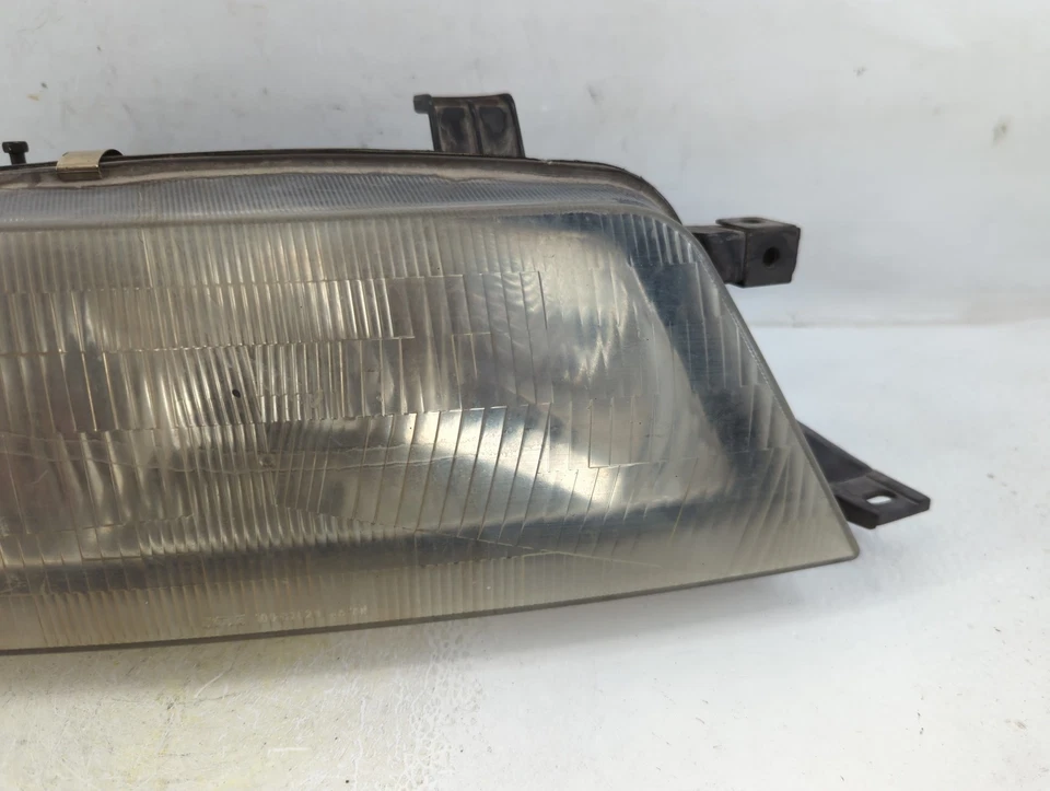 Faro luz izquierda conductor Suzuki Esteem 1995-1998 OEM YNN9O Foto 4 de 4