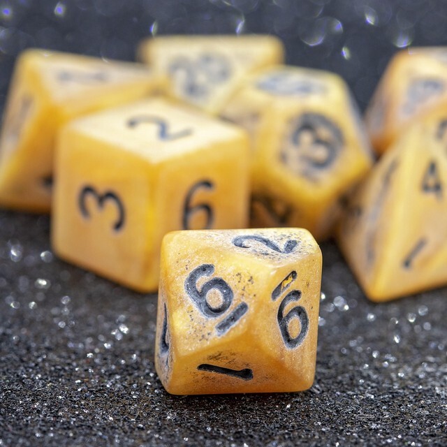 Sage's Ancient Golden Stone Black Ink Acrylic Polyhedral Dice Set