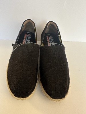 Bobs Casual black slip-ons with woven sole. Ideal for everyday wear.