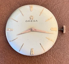 Vintage Omega Movement Cal 511 , dial & hands - balance ok - for parts or repair