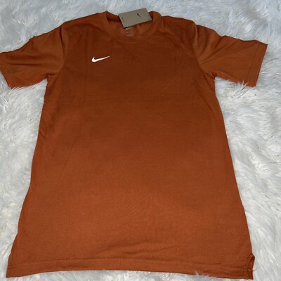 brown and orange nike shirt