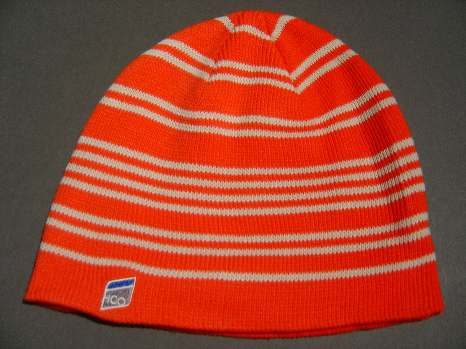 orange skull cap