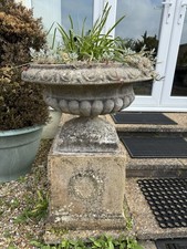 Large Pair of Weathered Urn and Plinth