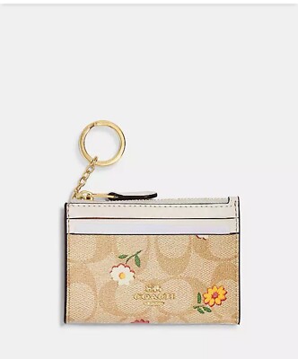 coach small zip around wallets for womens