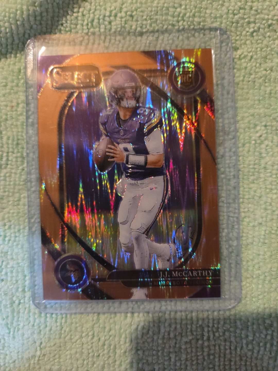 J.J. McCarthy 2024 Panini Select Copper Prizm Shock #246 SN,RC,/299