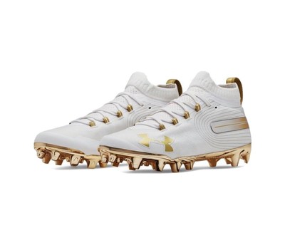 white and gold cleats