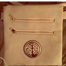 Lt. Pink Crossbody Bag with several pockets for Wallet and etc.