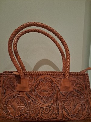 Alejandro Yeo brown leather purse. 