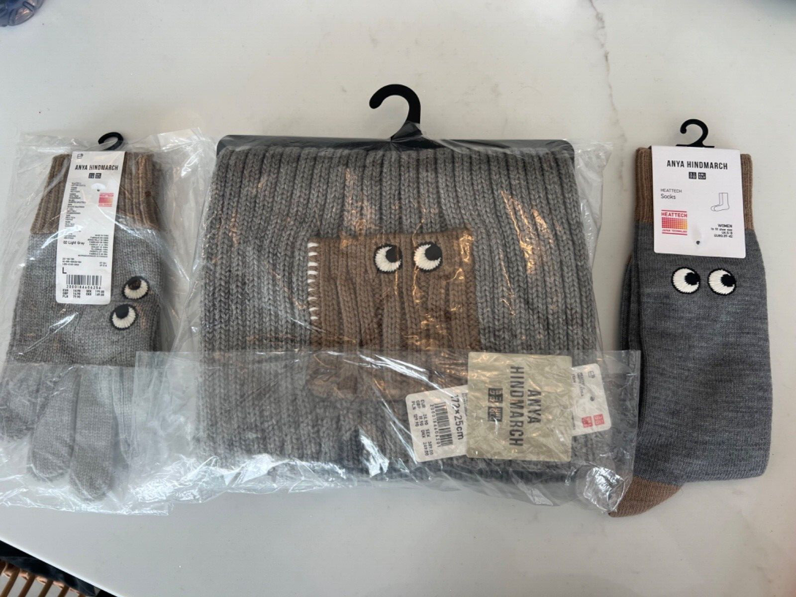 Anya Hindmarch Uniqlo Grey Scarf, Gloves  and Socks Set 👀  SOLD OUT