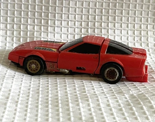 BANDAI 1984 Go Bots Puzzler Tic Tac Red Corvette