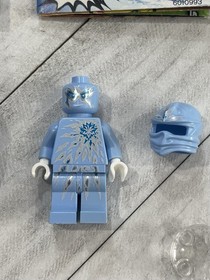 LEGO Ninjago: NRG Zane (9590)Minifigure w/ some weapons and spinner