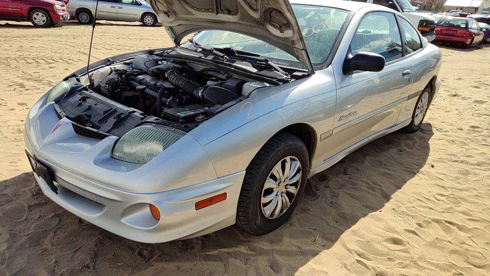 Pontiac Sunfire 2002 conductor conjunto de nudillo trasero izquierdo eje original con buje Foto 4 de 4