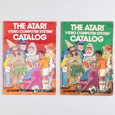 2 Atari Video Computer System Catalogs - 1981 Red/Orange/Green