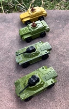Lesney Matchbox Rolamatics Stout Scout Cars (X2) and Weasels Tanks (X2) Diecast