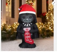 5  DARTH VADER IN A SANTA HAT HOLDING A CHRISTMAS STOCKING CHRISTMAS INFLATABLE