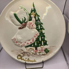 Christmas 1977 plate with tree and girl. Hand painted. Byron molds.Vtg