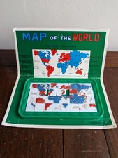 VINTAGE PLASTIC PUZZLE MAP OF THE WORLD Made in Hong Kong Sliding Toy